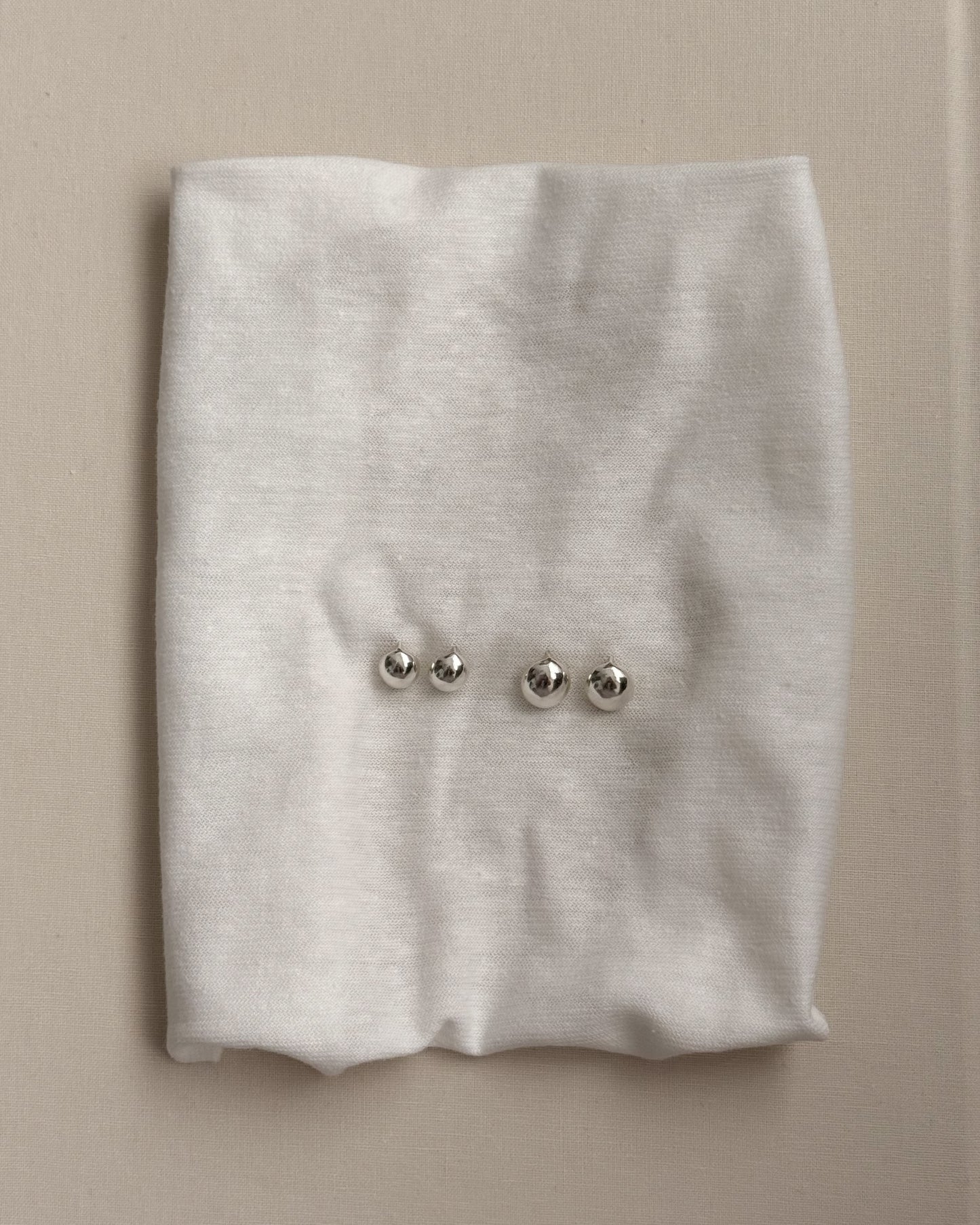 HANDCRAFTED SILVER OVAL BALL EARRING