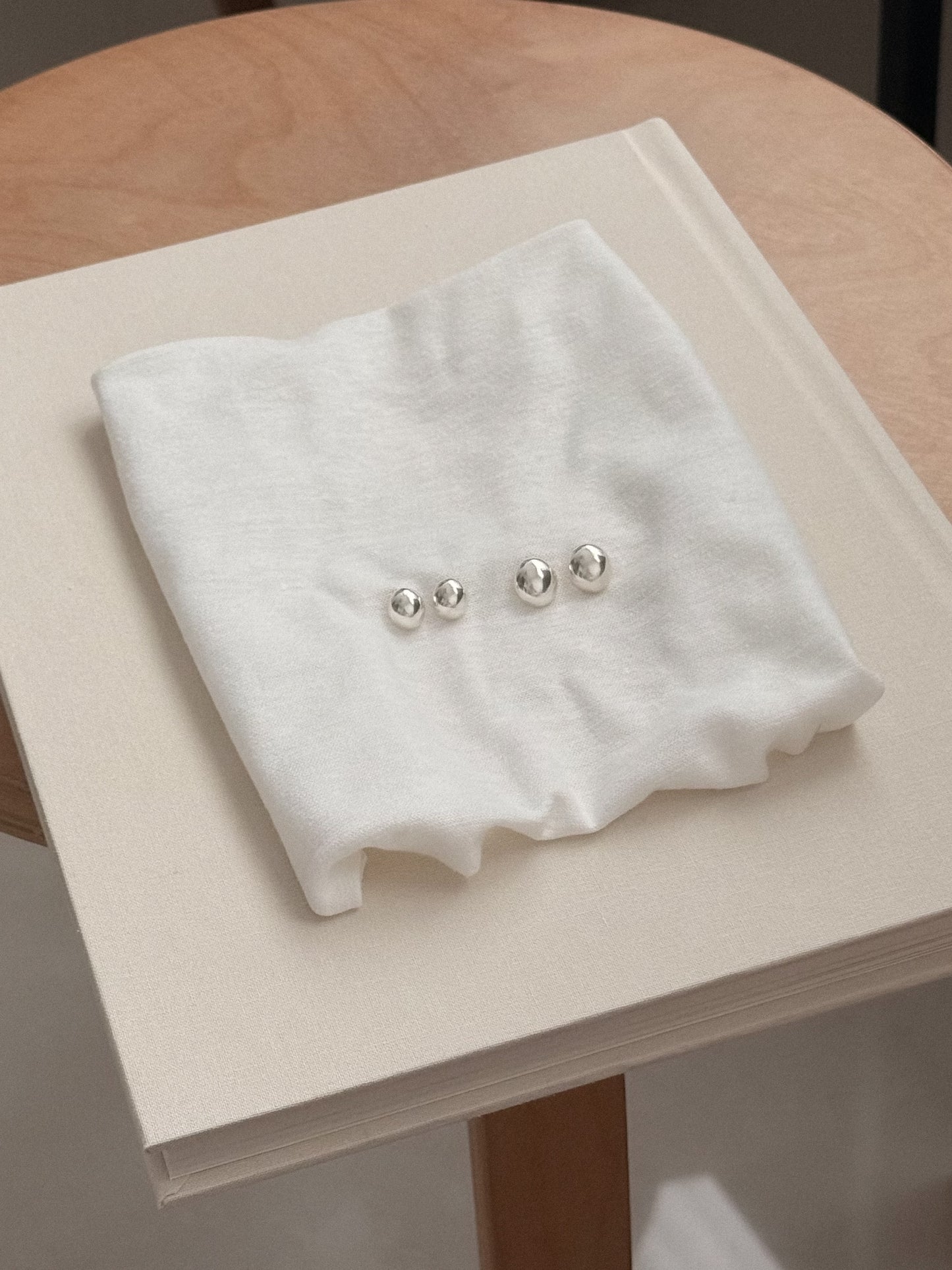 HANDCRAFTED SILVER OVAL BALL EARRING