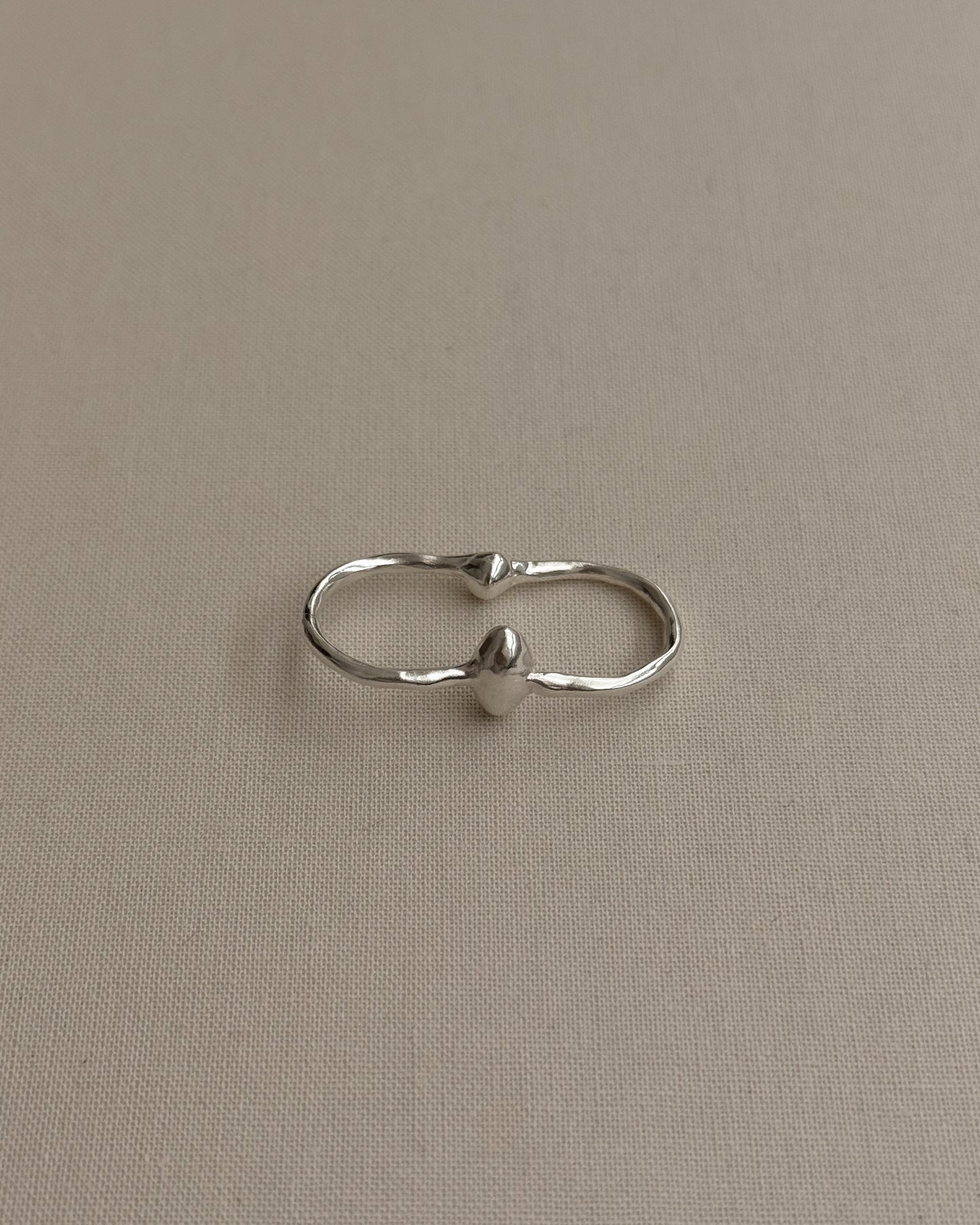 HANDCRAFTED SILVER EGG DOUBLE RING